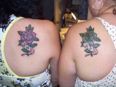 mother and daughter matching tattoos The photo on the left shows a touching