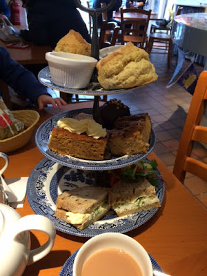 Tower plates with sandwiches and cakes