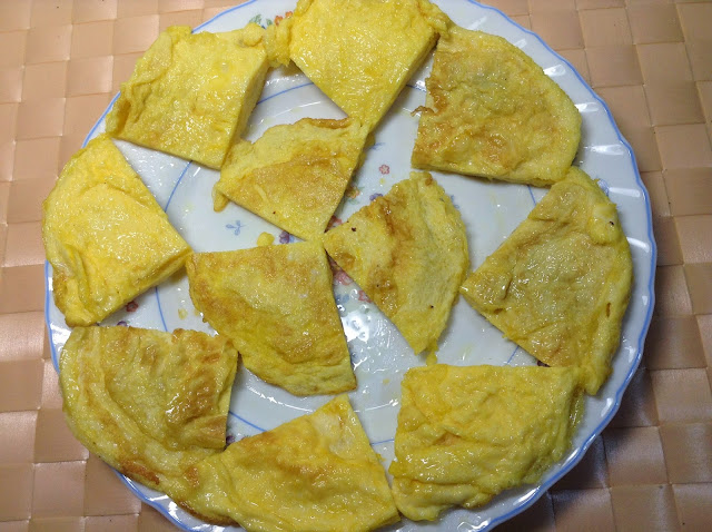 Fried eggs cut into small pieces