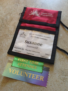 CSLA Conference name badge with First Time Attendee and Volunteer ribbons