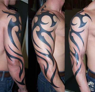 Large tribal arm tattoos