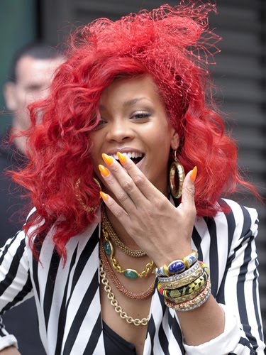 rihanna red hair long. rihanna long red hair 2010