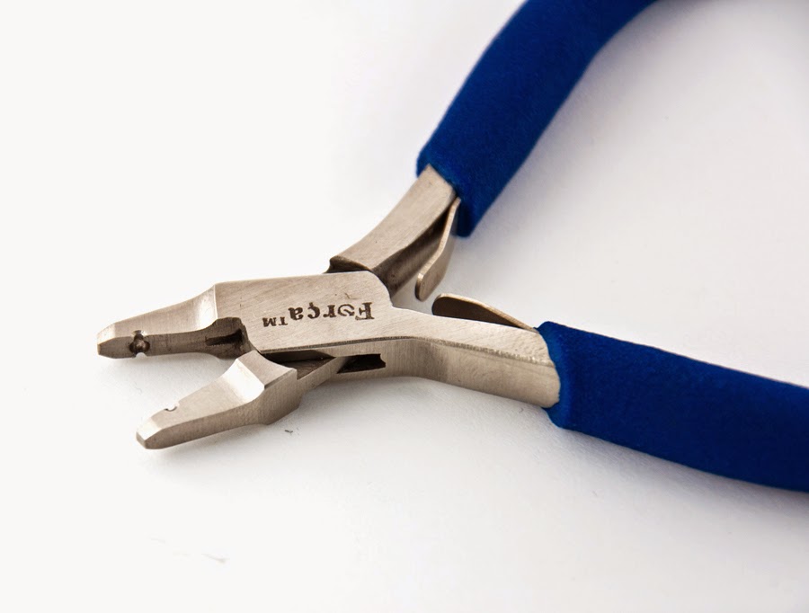 http://www.justpliers.com/53-magical-beads-forming-crimping-pliers