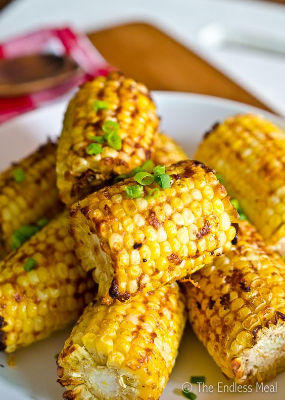 The combination of Parmesan cheese, butter, garlic and other seasonings is out of this world! Smoky Parmesan Corn on the Cob | The Endless Meal.
