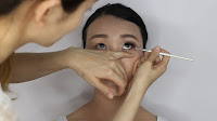 Modern Oriental Bridal Makeup - Use the same gel liner on the bottom lashline