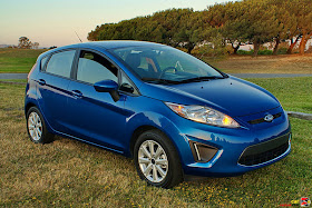 Blue 2011 Ford Fiesta 5-door parked in rural setting