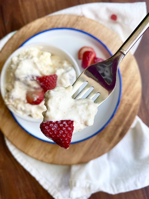 Angel Food Strawberry Fluff, one bite in a close up on a fork