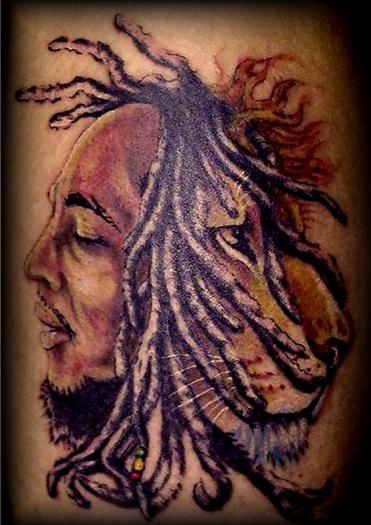 Deceased pet tattoo fail. It resembles an infectious tattoo bob marley