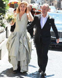 Florian Haertel's ex-wife Alex Kingston in wedding dress with her husband