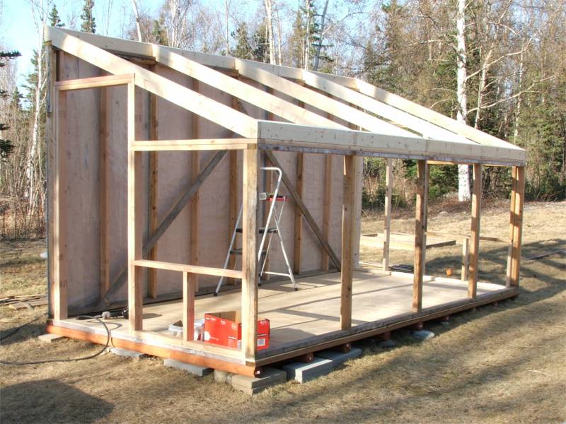  really like the idea of an attached storage shed on the North side