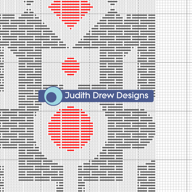 Judith Drew Designs a close up of a section of the counted stitching chart.