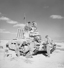 A British Matilda tank and crew near Tobruk, 1 December 1941 worldwartwo.filminspector.com