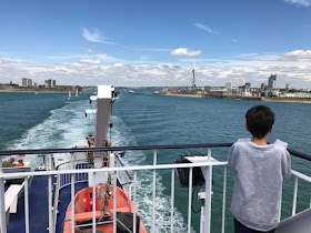 View from the back of a car ferry across Portsmouth