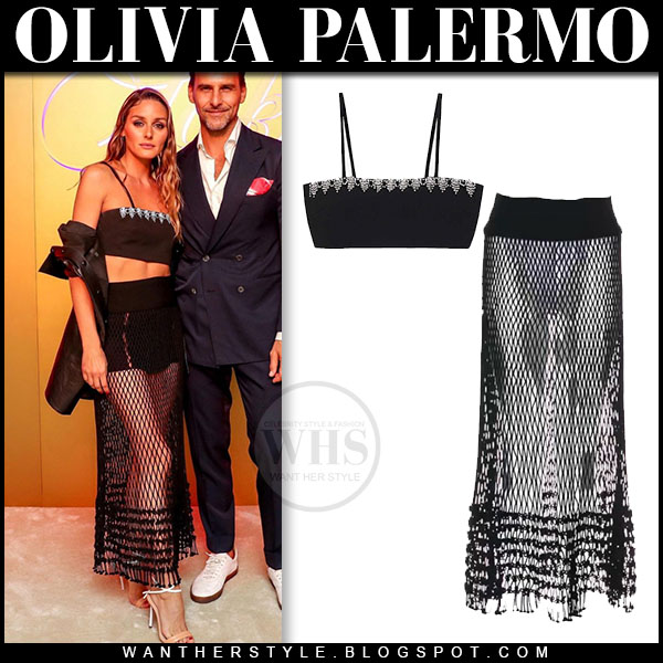 Olivia Palermo in black bra top and black sheer open knit skirt