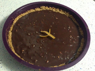 Tarta de chocolate, almendras y naranja