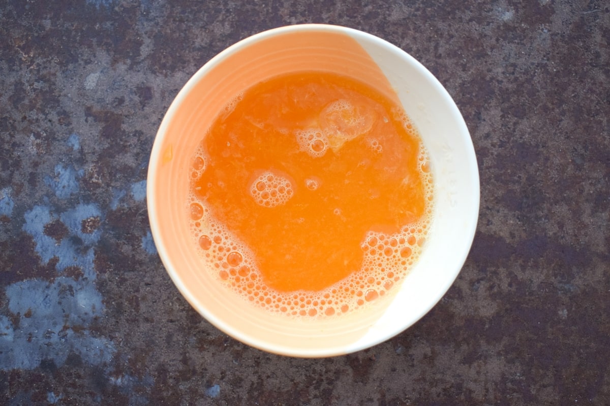 orange juice in a bowl.