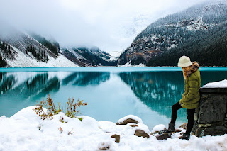 Woman traveling solo in a frozen lake