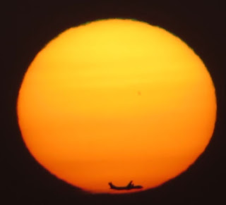 Mercury Transit sunset with airplane