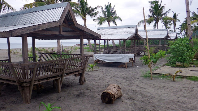 the row of open type day-use cottages at Bislig Beach Resort in Tanauan Leyte