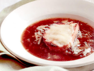 French Onion Soup: Classic onion-based soup served topped with French bread and cheese