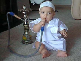 Funny Photo Funt  A funny little baby smoking a coal