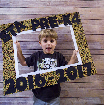 This was the easiest photo frame to make.  Use an X-Acto knife to cut a rectangle out of a poster board.  Line the poster board with cute duct tape.  Glue on pre-cut letters and VOILA!  Super cute Back to School/ 1st day of school pictures!