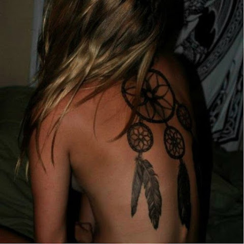 Somebody Actually Got The Mother Of Cliché Tattoos!