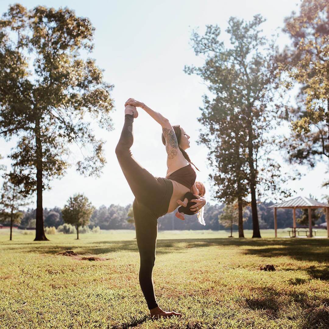 Mind-Blowing Pictures Of Woman Who Is Doing Yoga Poses While Breastfeeding Her Baby