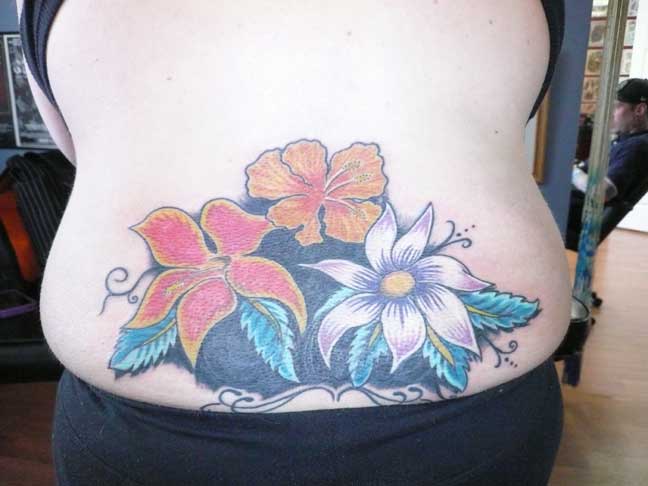 The finished cover up tattoo Now flowers definitely look better than some