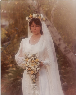 Me in my homemade wedding dress Steve helped make the buttons all 30 of 