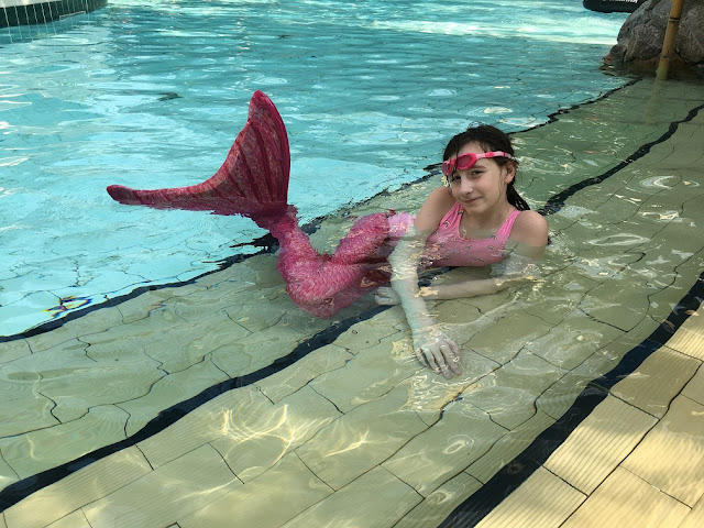 sasha in mermaid tail and fin at center parcs