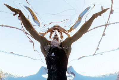 Hugues Dubosq of France competes in a men's 100-meter breaststroke semifinal at the FINA Swimming World Championships