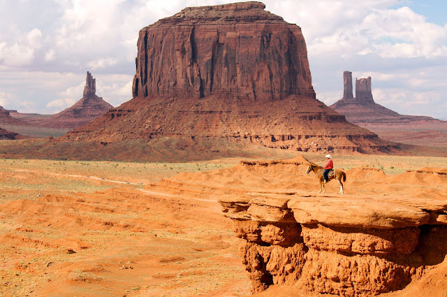 image of man riding at monument valley