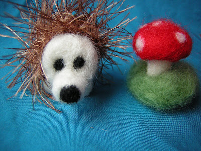 mushroom and hedgehog side by side