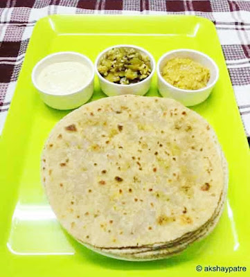 broccoli stuffed paratha in a serving plate