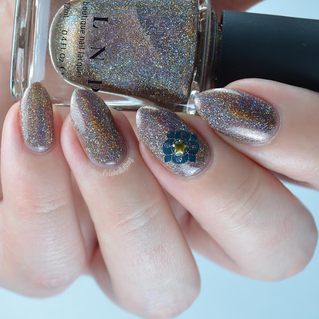 brown holographic nail polish with star and stamp