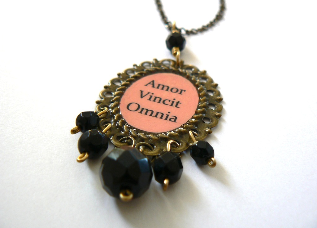 amor vincit omnia calligraphy. amor vincit omnia meaning.