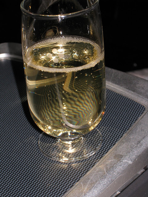 Champagne is served as welcome drink on JL061