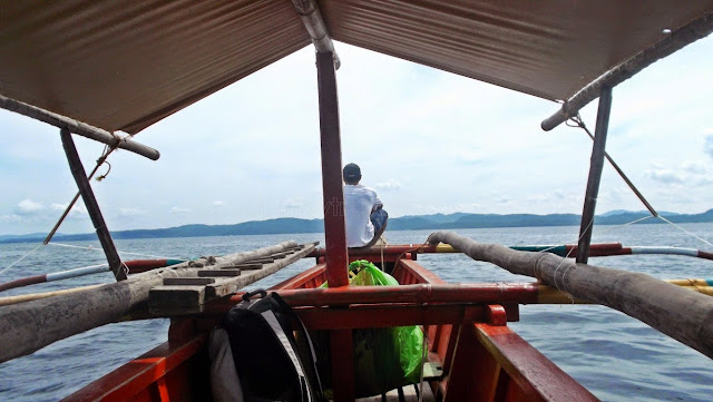 outrigger boat on the way to Victoria at San Antonio, Dalupiri Island, Northern Samar