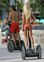 Shauna Sand And Her Airbags On A Segway 