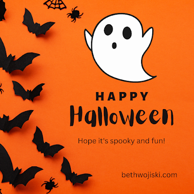Happy Halloween Greeting with bats and ghosts