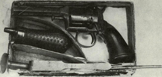 Fordyce Beals developed tiny solid frame revolver before War that had screw-in barrel and cylinder pin taken out from front. Shown is original outfit in cardboard box with mould, flask, loading plunger. Handle is gutta percha.