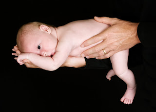 baby photography of Keller Texas newborn in studio on black background