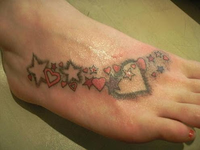 Colorful stars and hearts foot tattoo. Foot Star Tattoo