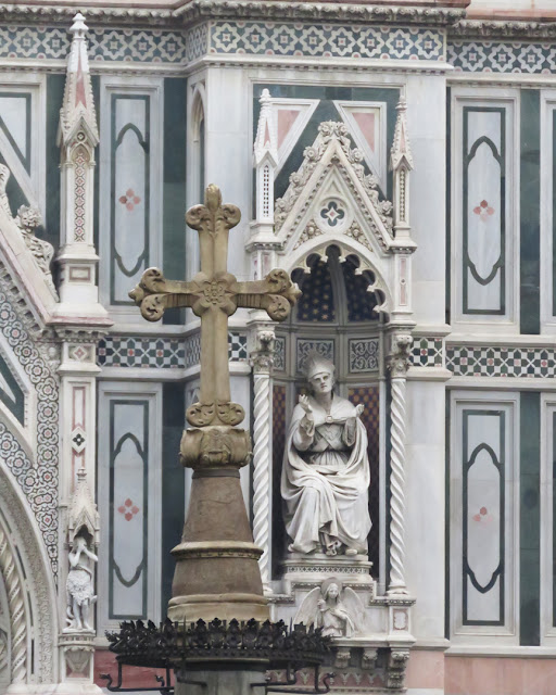 Detail of the facade of Santa Maria del Fiore, Saint Mary of the Flower, Colonna di San Zanobi, Column of Saint Zanobi, Florence