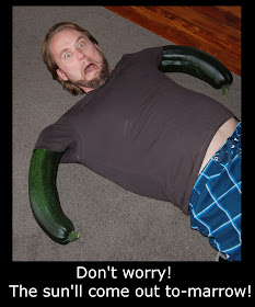 Guy on floor with zucchinis for arms