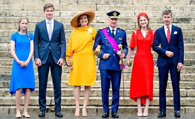 Princess Elisabeth wore a red midi dress by Victoria Beckham. Queen Mathilde, Princess Claire, Princess Delphine