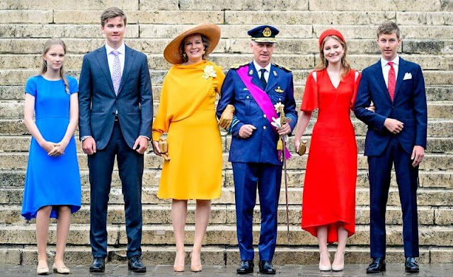 Princess Elisabeth wore a red midi dress by Victoria Beckham. Queen Mathilde, Princess Claire, Princess Delphine