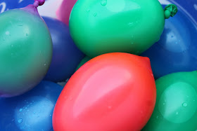 A fun twist on ordinary water balloons and a trick for filling them.