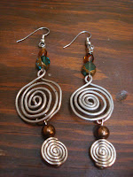 Double Swirled Metal Earrings by hotGlued